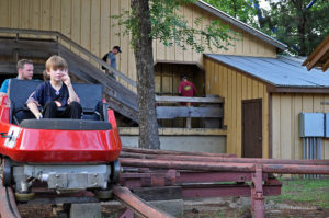 Train on the Mini Mine Train departs the station