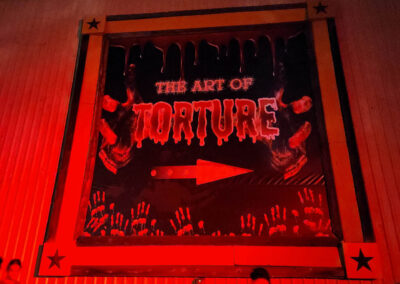 Art of Torture haunted house sign