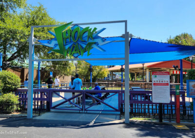 New covered seating area in the Shock Wave queue entrance