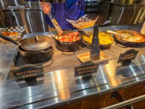 Buttered corn, smashed potato, and mac & cheese