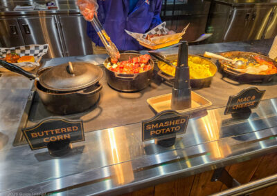 Buttered corn, smashed potato, and mac & cheese