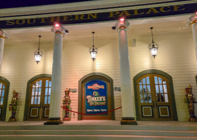 The recently-renovated exterior of Southern Palace Theater advertising Tinker's Toy Factory