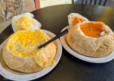 Broccoli cheddar and tomato bisque soups in sourdough bread bowls from Cozy Cafe