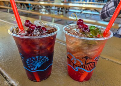 Holiday cocktails with cranberry garnishes