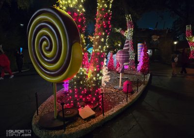 Candy-themed holiday decor near Pirates of Speelunker Cave