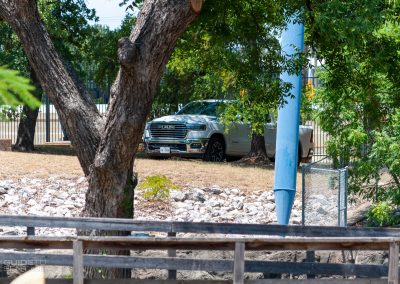 A truck parked underneath Shock Wave