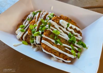 Potato latke with sour cream drizzle