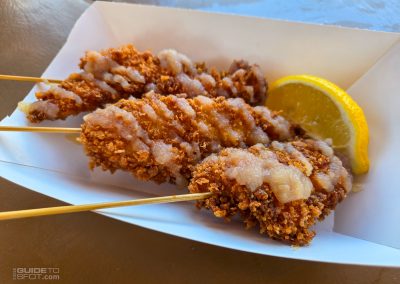Chicken schnitzel with applesauce drizzle at Oktoberfest 2026