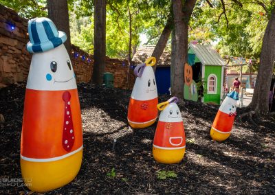 Candy corn family used as Halloween decor in Tricks and Treats 2026