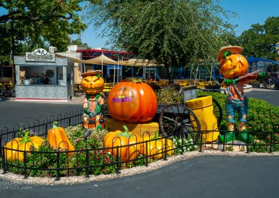 Decor for the Tricks and Treats event including pumpkin scarecrows